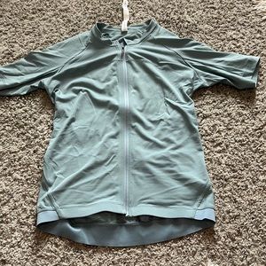 Light blue athletic shirt from LuluLemon!! Super comfy and has pockets in back!